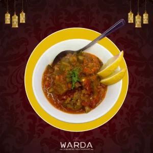 Tender Okra Cooked In A Rich Tomato Sauce With Garlic And Onions, Creating A Comforting And Savoury Dish With A Tangy Flavour.