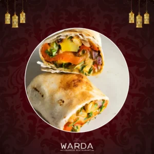 A Batata Harrah Wrap With Spiced, Crispy Diced Potatoes, Fresh Vegetables, And Aromatic Herbs In Soft Pitta Bread.