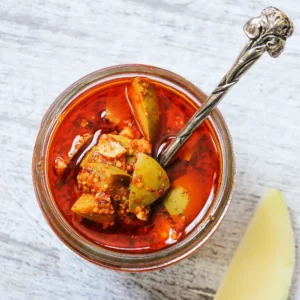 A colourful assortment of Lebanese pickles, including cucumbers, carrots, and cauliflower, marinated in vinegar and spices.